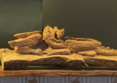 Lotta di mostri, scultura a tutto tondo, legno di pero 80x20x20